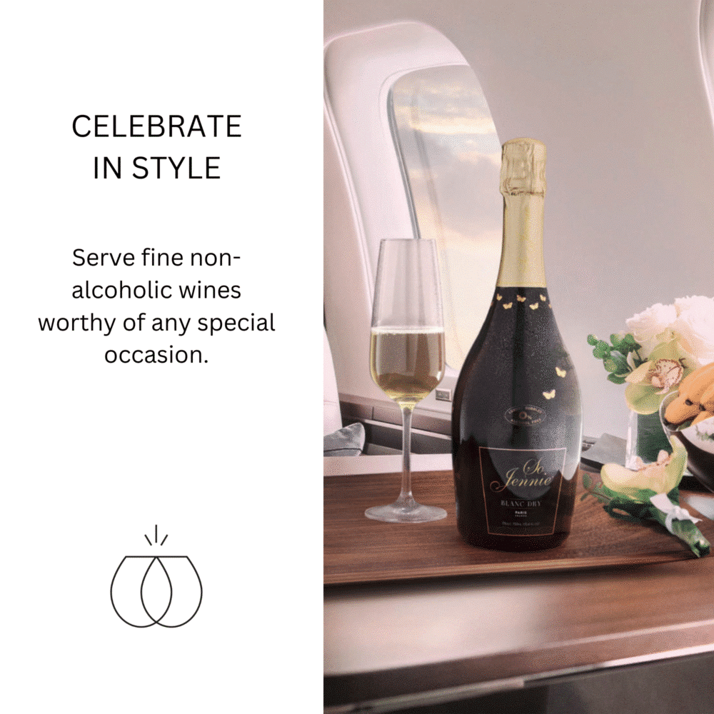 So Jennie Paris Blanc Dry sparkling wine served in-flight with a glass on a tray table, symbolizing first-class non-alcoholic elegance.