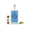 Roots Divino Aperitif Bianco non alcoholic aperitif bottle with award medals and rosemary lemon garnish