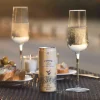 Lyre’s Classico sparkling RTD can and 4 pack with champagne flutes