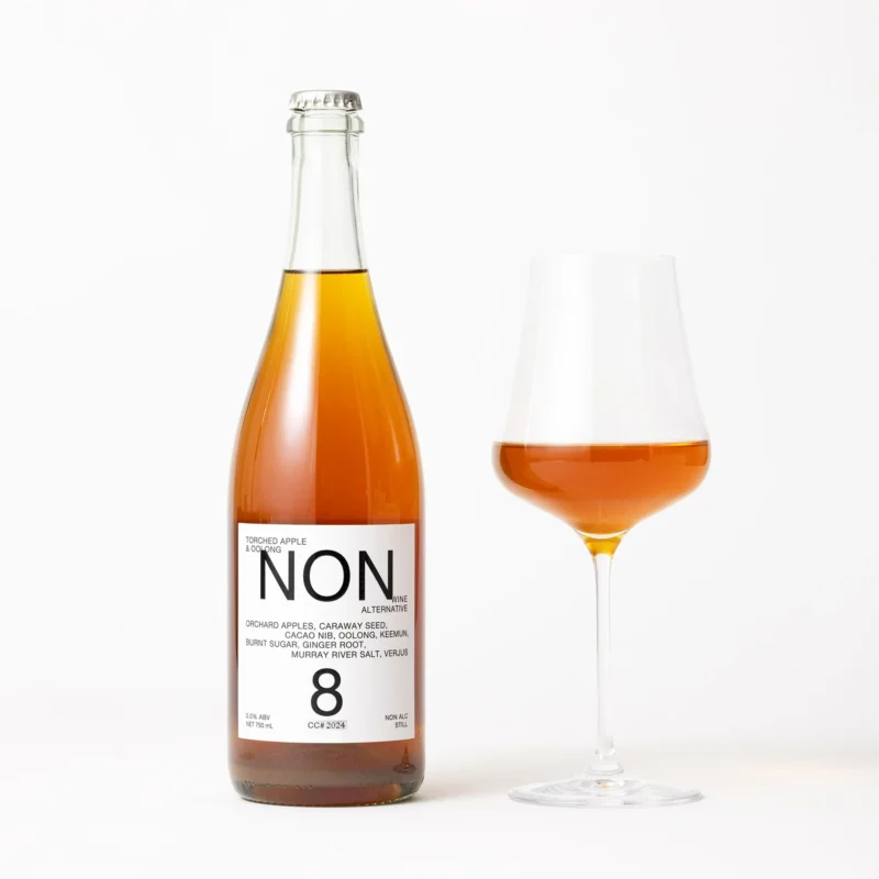 NON8 Torched Apple & Oolong still wine alternative bottle and filled wine glass