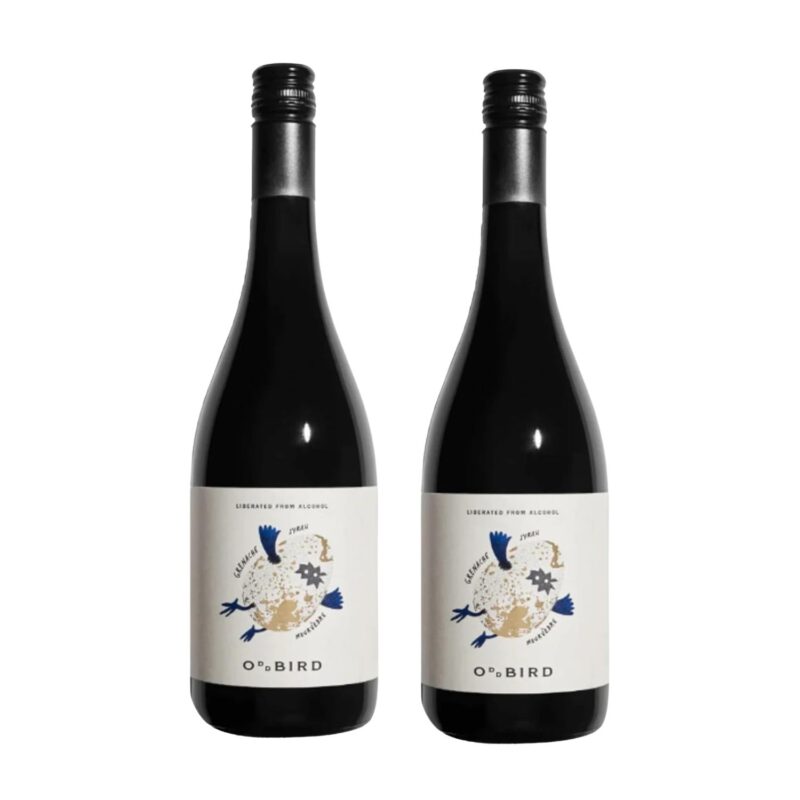 Two bottles of Oddbird GSM Non-Alcoholic Red Wine arranged in a case set with original labels visible