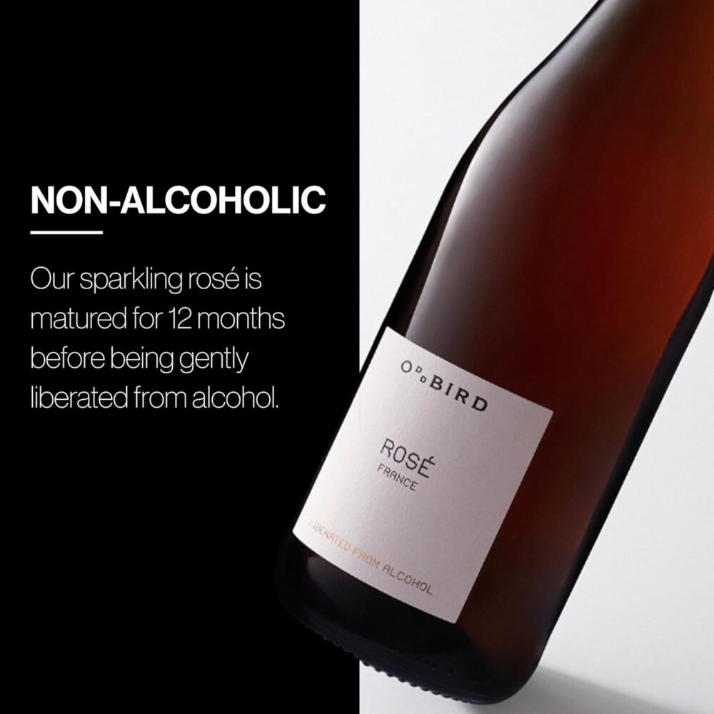 Close-up of Oddbird Sparkling Rosé bottle with text explaining that the wine is aged for 12 months before gentle dealcoholization.