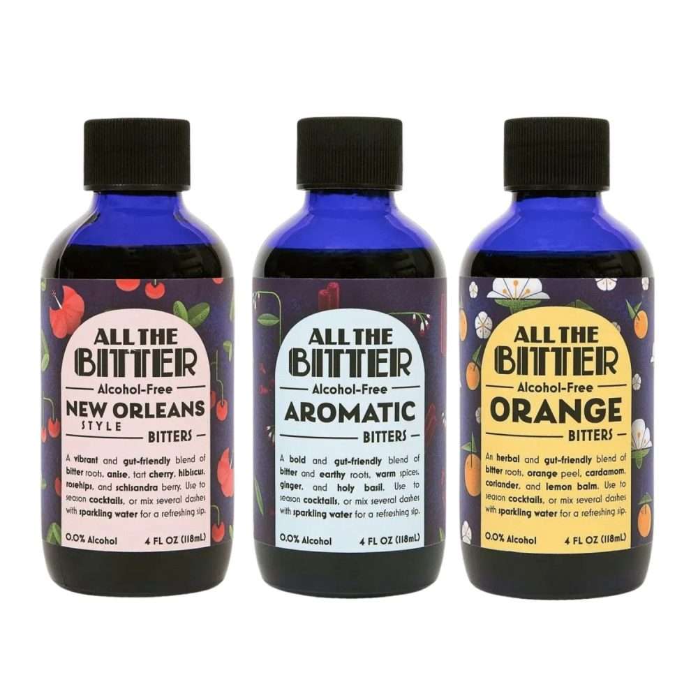Set of three All The Bitter non-alcoholic bitters bottles—Aromatic, Orange, and New Orleans style—organic, alcohol-free cocktail bitters.